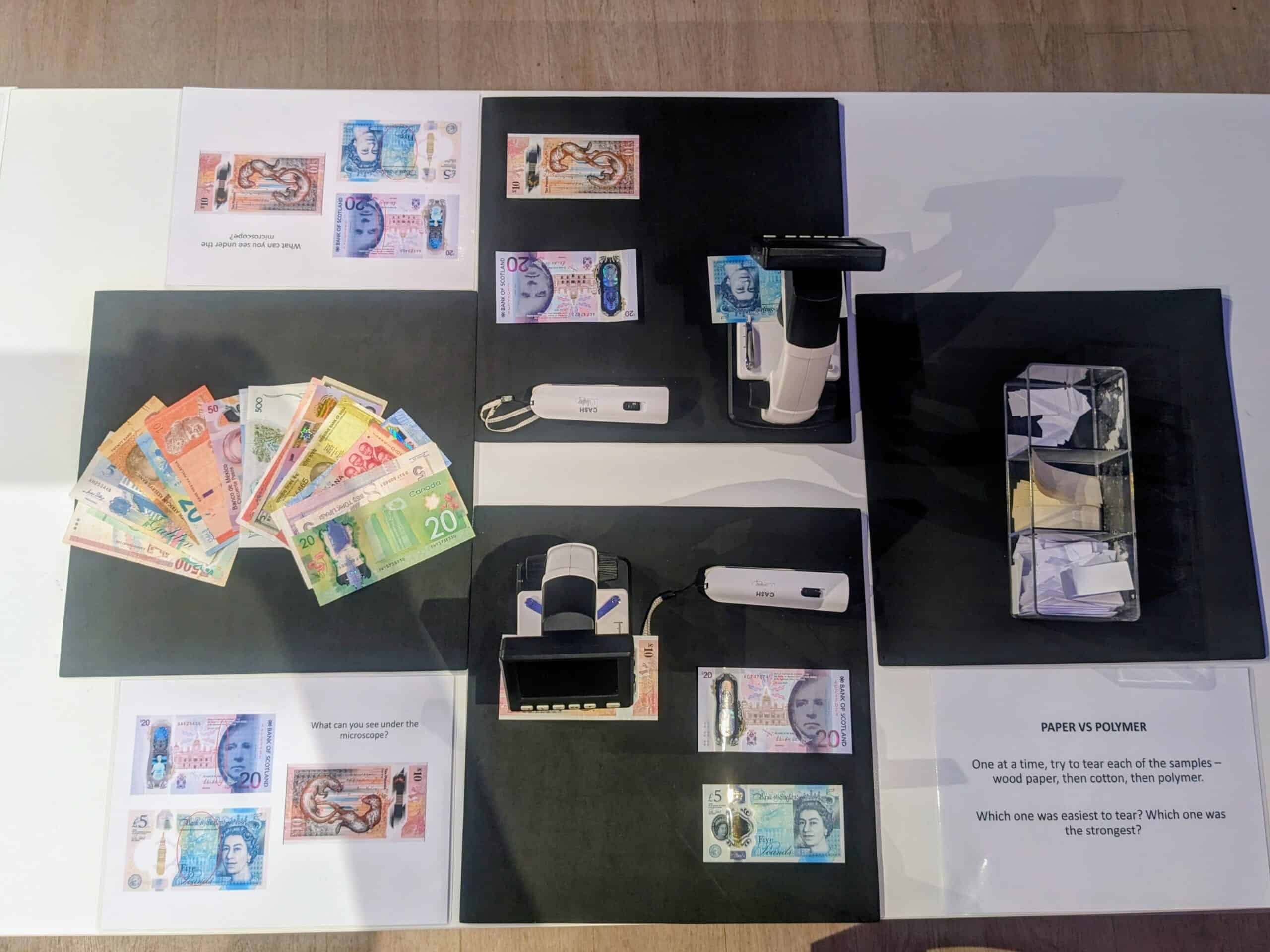View of handling table showing banknotes from around the World